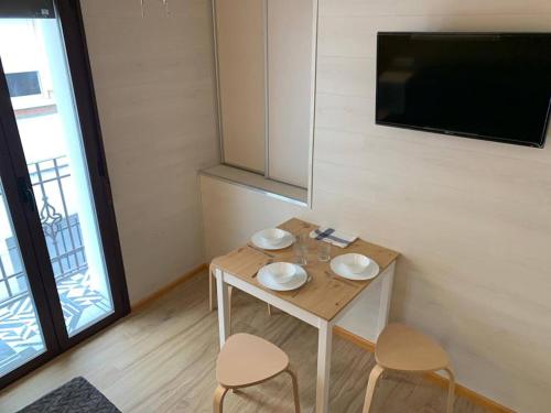 TV a/nebo společenská místnost v ubytování Benidorm Center Puerto Poniente 1º