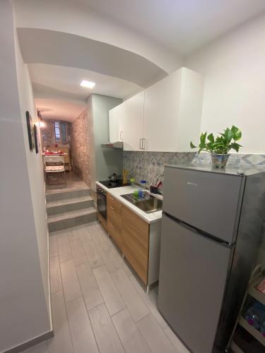 Cuisine ou kitchenette dans l'établissement ARTNAPOLI