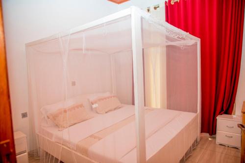 Säng eller sängar i ett rum på Leisure Safaris and Inns
