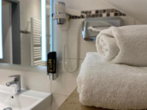 Koupelna v ubytování Hotel Harburger Hof