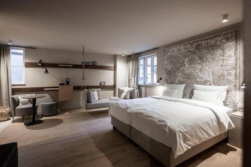 Postel nebo postele na pokoji v ubytování HOTEL & SPA Goldene Rose