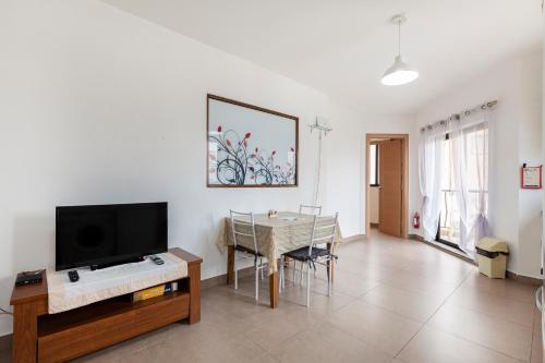 Télévision ou salle de divertissement dans l'établissement Corner view apartment