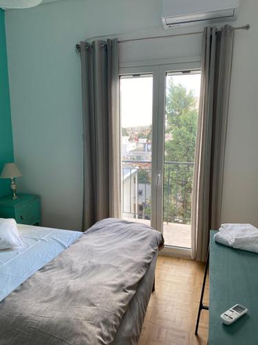Posteľ alebo postele v izbe v ubytovaní Ioli Β2 apartment