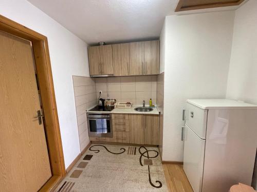 Una cocina o zona de cocina en Apartmani BROD