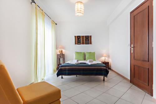 Postel nebo postele na pokoji v ubytování Cabanas Downtown