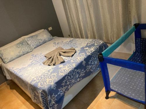 Postel nebo postele na pokoji v ubytování MARTSARAs PISCINA SARDINA