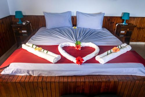 Ένα ή περισσότερα κρεβάτια σε δωμάτιο στο Les Elles Guesthouse Self Catering