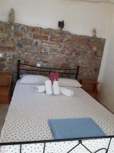 Кровать или кровати в номере Giota & Antonia Apartments