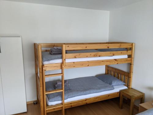 a couple of bunk beds in a room at Schiablick - Broggini in Davos