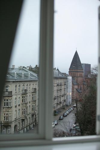 Nespecifikovaný výhled na destinaci Kodaň nebo výhled na město při pohledu z apartmánu
