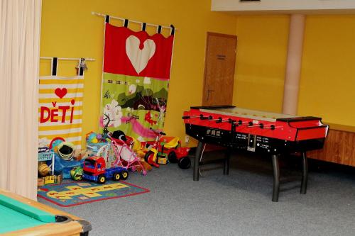 Dětský klub v ubytování Hotel Prichovice