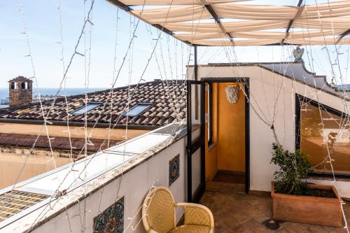 a balcony with a view of a building at Raciti Palace in Acireale