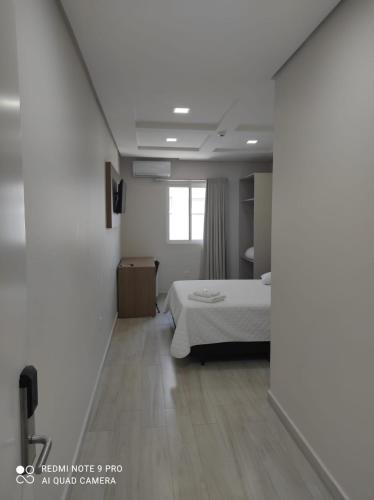 Katil atau katil-katil dalam bilik di Hotel Serrano