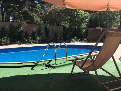Kolam renang di atau dekat dengan Bałtyk Apartamenty Poddąbie