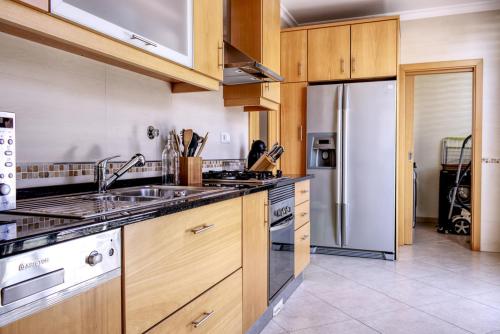 Een keuken of kitchenette bij Apartamento Casa Cláudia