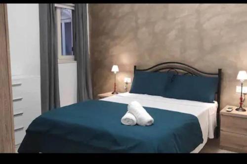Ліжко або ліжка в номері Valletta Apartment with Harbour Veiw