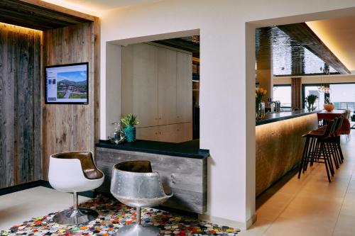 Posezení v ubytování Home suite home