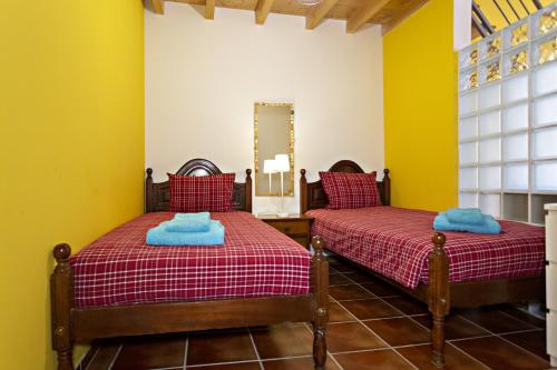 Postel nebo postele na pokoji v ubytování Casa Lopes