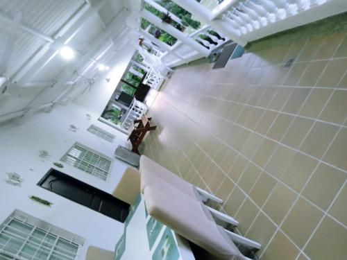 an overhead view of a room with white tiles at Finca San José los Naranjos in Santa Marta