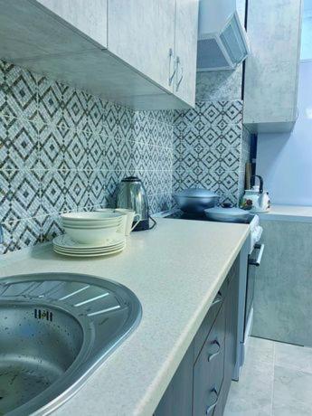 Dapur atau dapur kecil di Студия в ЖК Ушсункар