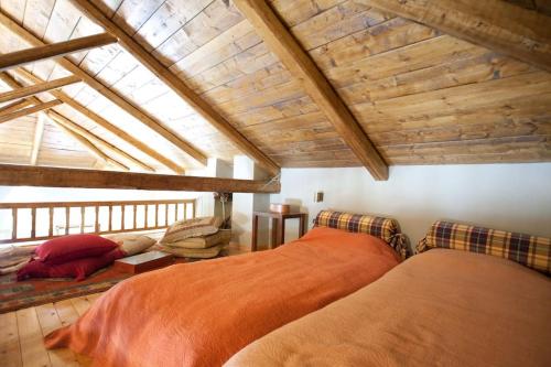 a bedroom with two beds in a attic at House in Delphi in Delphi