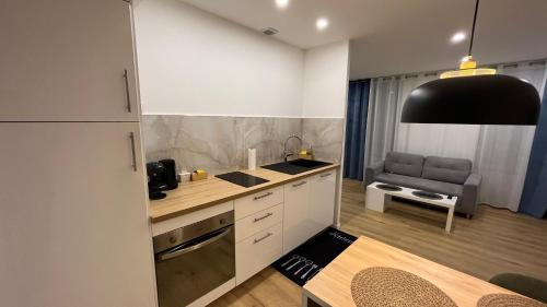 Dapur atau dapur kecil di Appartement Luxe Jaune