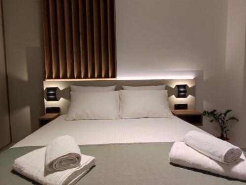 Postel nebo postele na pokoji v ubytování Ruby Luxury Suites