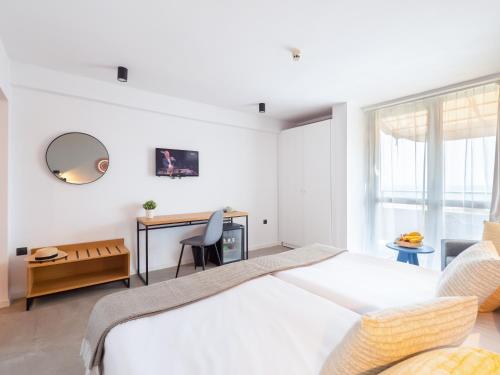 מיטה או מיטות בחדר ב-Hotel Excelsior - All Inclusive