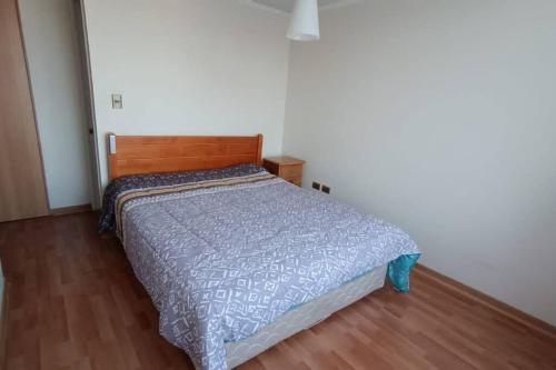 Ένα ή περισσότερα κρεβάτια σε δωμάτιο στο Departamento Playa Paraiso