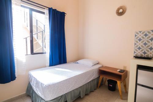 Nido Colibrí - Private Rooms and hostel Dorms in Remate de Paseo Montejoにあるベッド