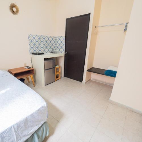 Nido Colibrí - Private Rooms and hostel Dorms in Remate de Paseo Montejoにあるベッド