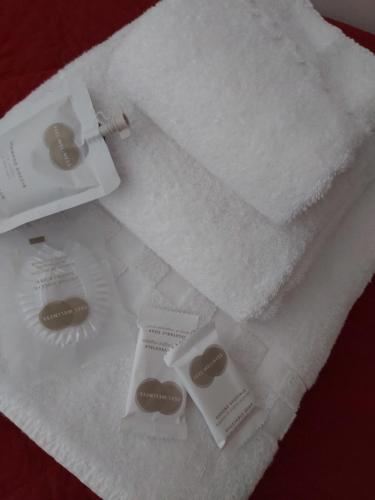 a package of toilet paper and a toothbrush on a table at Al Convento in San Mauro Castelverde