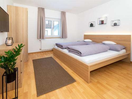 Postel nebo postele na pokoji v ubytování Haus Andrea
