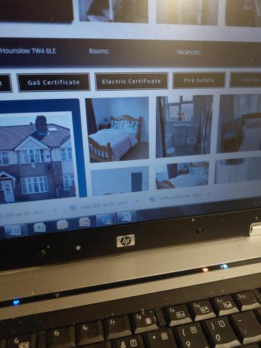 un écran d'ordinateur portable avec une photo d'une maison dans l'établissement Diamond accommodation, à Londres