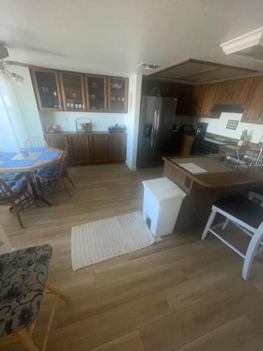 an aerial view of a kitchen and living room at 4 Bedroom Home-Casino-State Farm Stadium only 2 Miles in Glendale