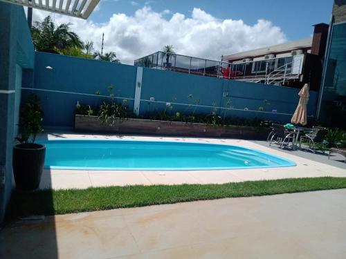 Der Swimmingpool an oder in der Nähe von Casa alto padrão Matinhos