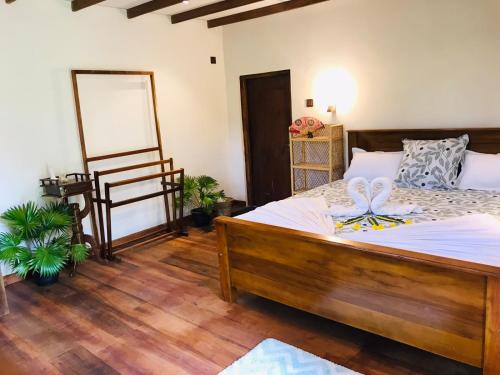 Postel nebo postele na pokoji v ubytování Coco Eco Lodge