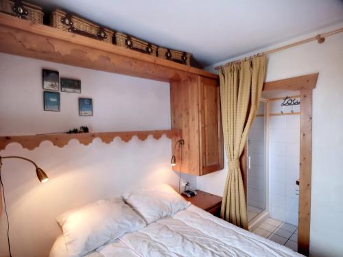 Photo de la galerie de l'établissement Charmant 3P aux Menuires, 43m², 2 ch, 2 sdb, 6 pers, pied des pistes, parking, balcon sud - FR-1-178-373, aux Menuires