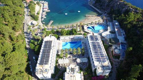 an aerial view of a resort with a pool at Turunc Resort Hotel in Turunc