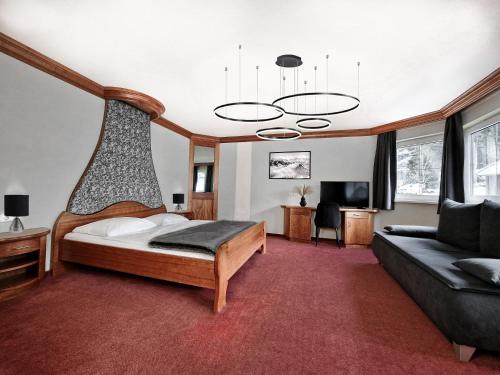 Postel nebo postele na pokoji v ubytování Hotel Lärchenhof