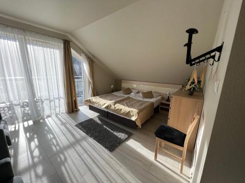 Un pat sau paturi într-o cameră la Apartament Czarna Góra - Solden - Sienna