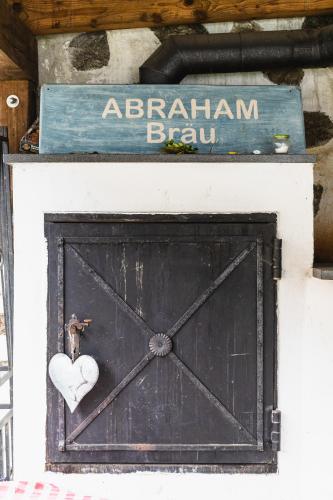 a sign that says elephant barn with a heart on a door at Biohof Abraham - Hofkäserei in Gossenreith