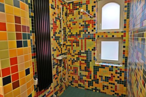 Kúpeľňa v ubytovaní Muralowy apartament Katowice Nikiszowiec