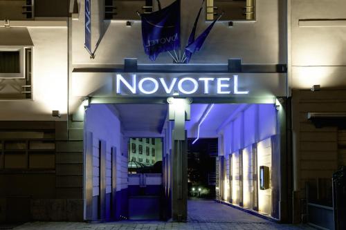 a noored sign on the front of a building at Novotel Gent Centrum in Ghent