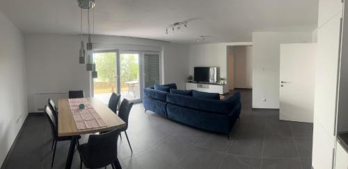 Χώρος καθιστικού στο Apartmani Lana