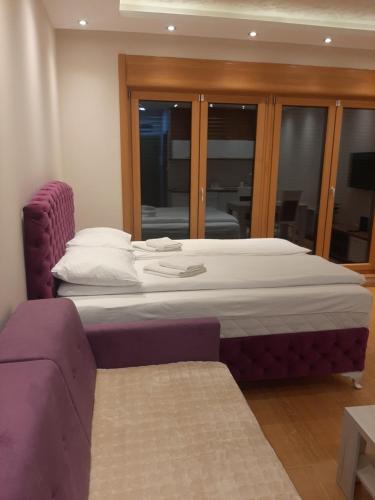 Postel nebo postele na pokoji v ubytování Falcon Zlatibor