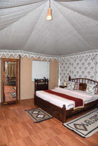 Postel nebo postele na pokoji v ubytování Jawai Nature Stay Jawai