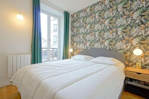 En eller flere senger på et rom på GemBnB Luxury Apartments - Commines 3