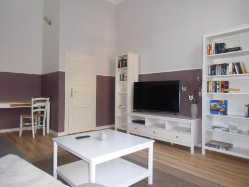 TV a/nebo společenská místnost v ubytování Udos Gästewohnung