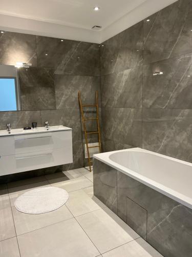 Kúpeľňa v ubytovaní Appartement sur le port
